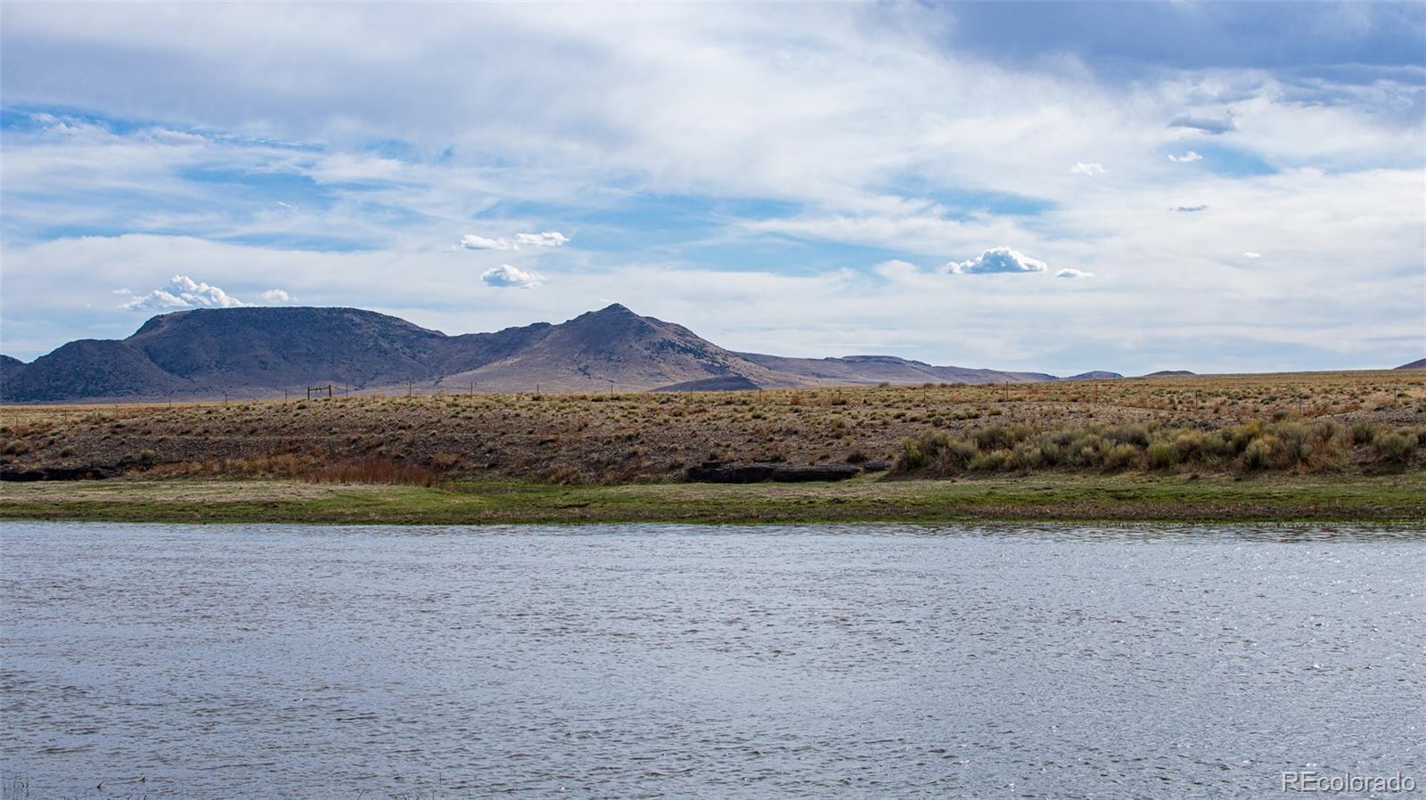 67 Kettledrum Road Sanford, CO 81151 - Photo 8 of 15 a view of mountain with lake view