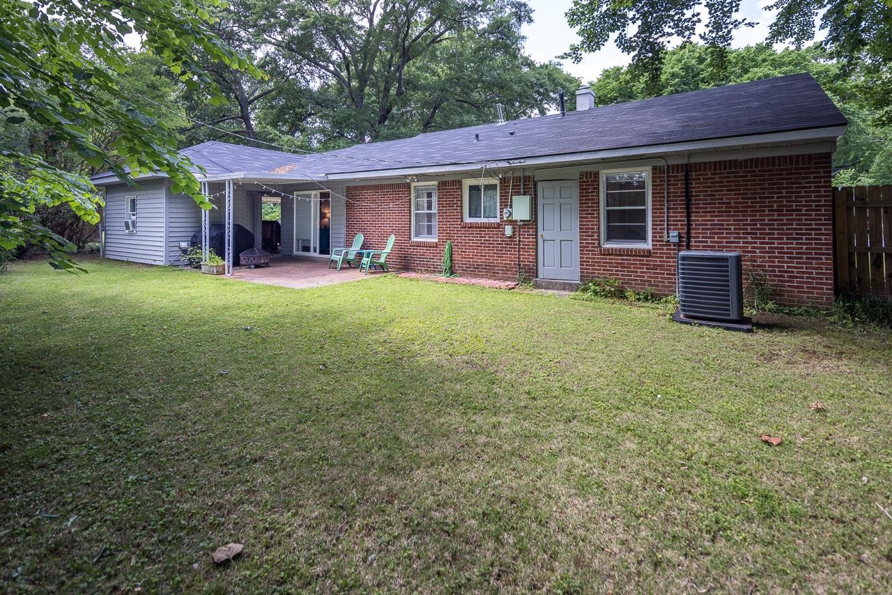 4611 Sea Isle Road Memphis, TN 38117 - Photo 20 of 24 a view of a house with a yard and porch