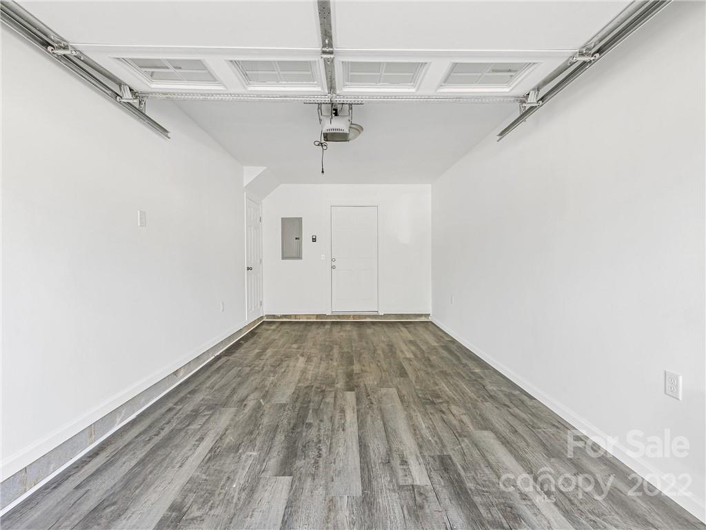 202 Sycamore Cv Road, Unit 1 Asheville, NC 28803 - Photo 7 of 10 a view of a room with wooden floor
