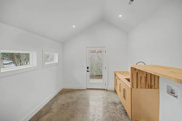 a view of a hallway with entryway