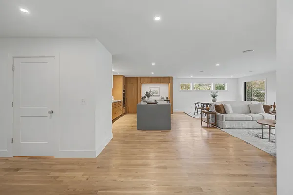a living room with furniture and a table