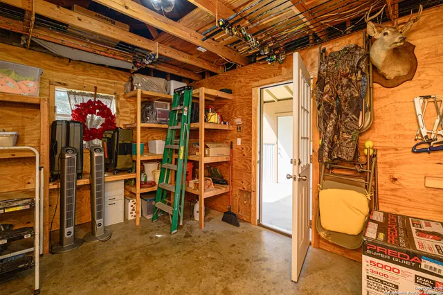 a kitchen with a sink appliances and cabinets