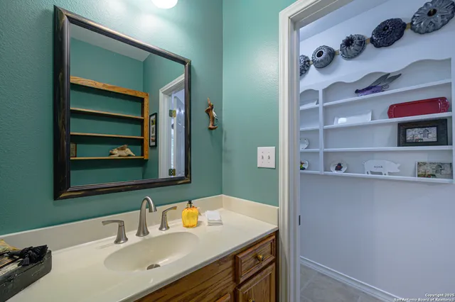 a bedroom with a bed and a tv on table