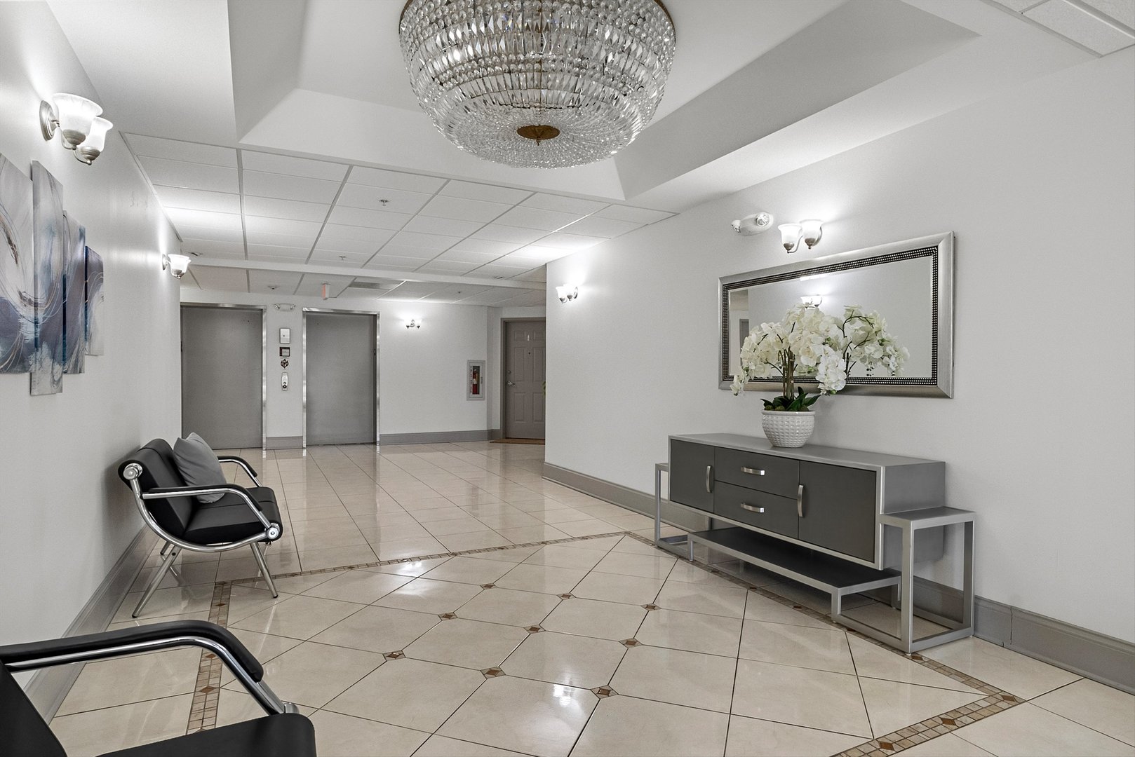 10 North Gilbert Street, Unit 314 South Elgin, IL 60177 - Photo 3 of 25 a living room with stainless steel appliances kitchen island granite countertop furniture and a view of living room