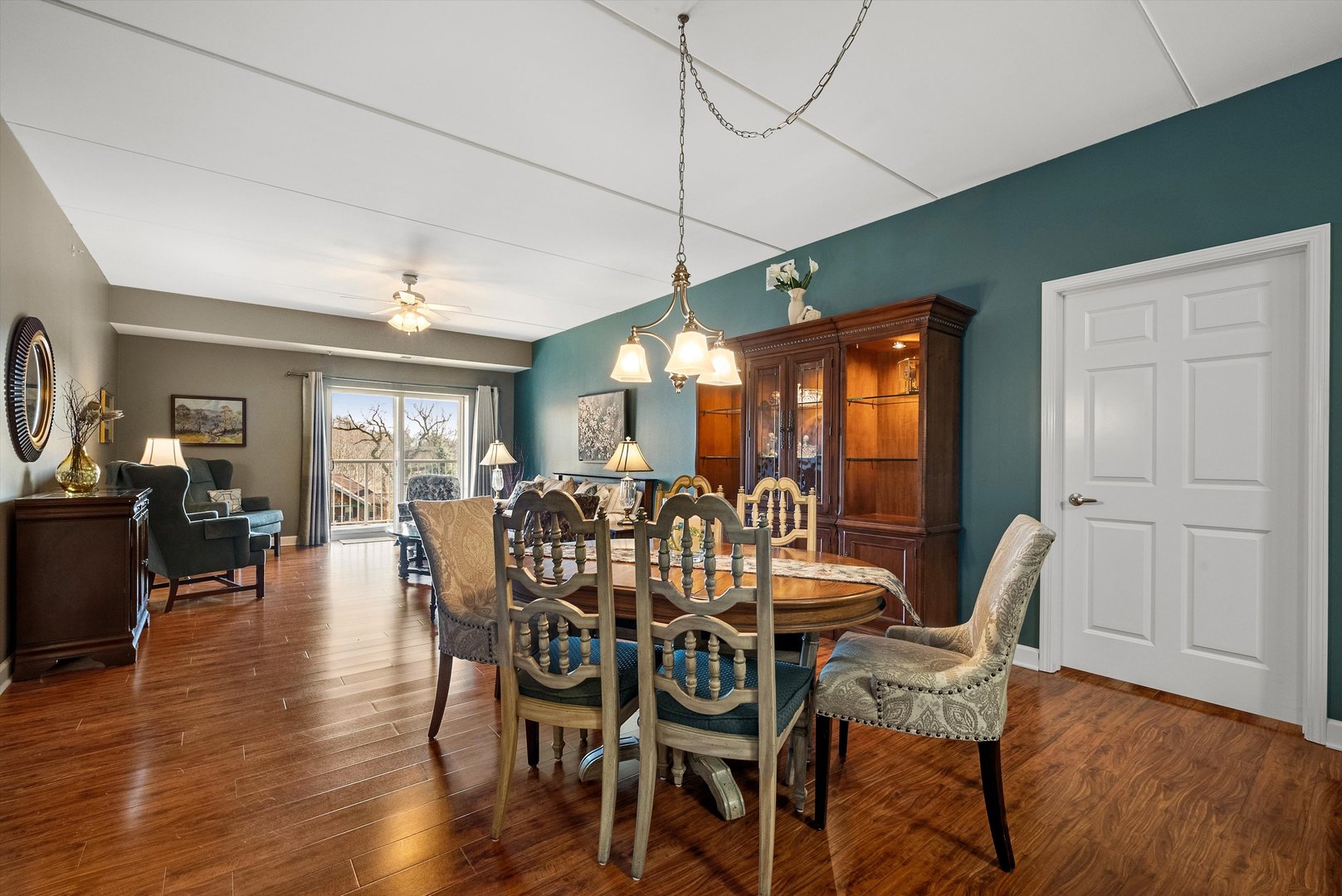 10 North Gilbert Street, Unit 314 South Elgin, IL 60177 - Photo 8 of 25 a view of a dining room with furniture window and wooden floor