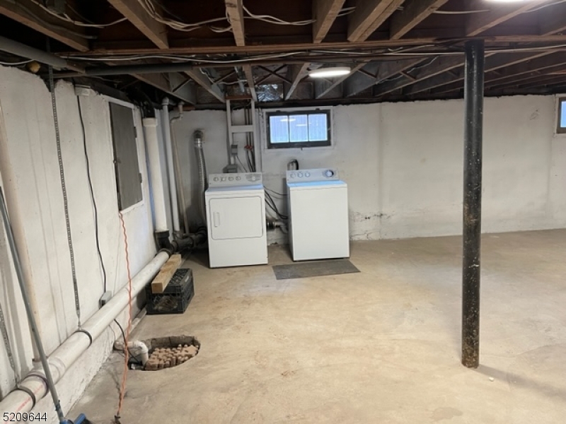 123 Clark Street Dover, NJ 07801 - Photo 11 of 12 a view of a room with storage and utility room