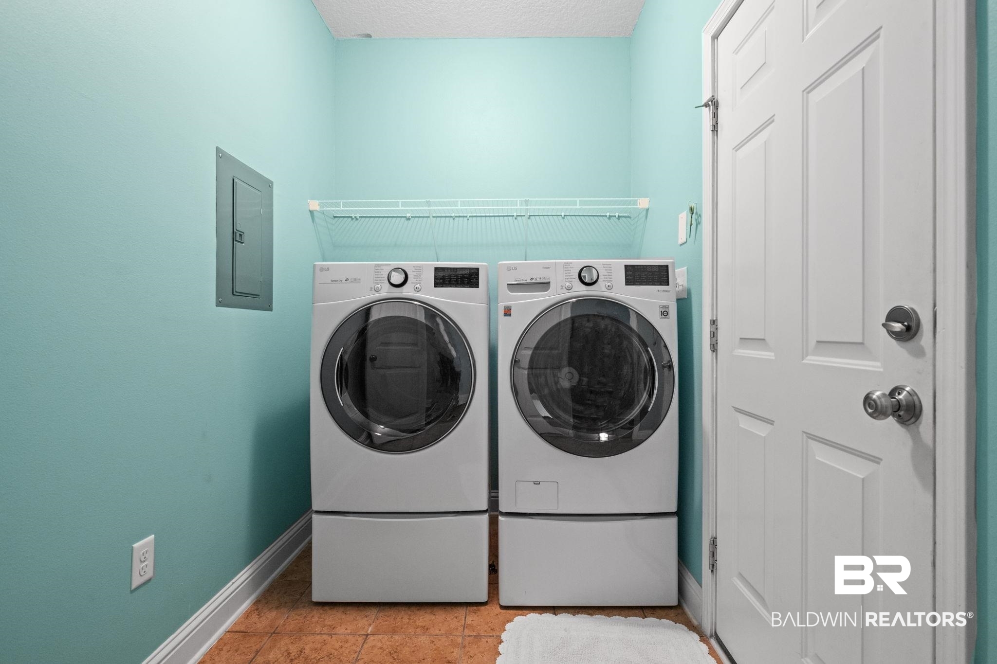 2554 Masters Court Mobile, AL 36618 - Photo 28 of 35 Laundry room featuring electric panel and washing machine and clothes dryer