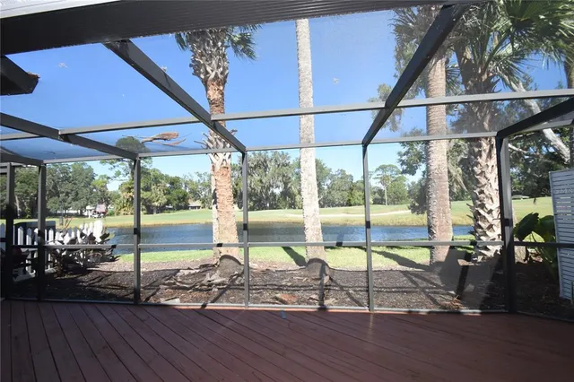 a view of a living room and a wooden floor