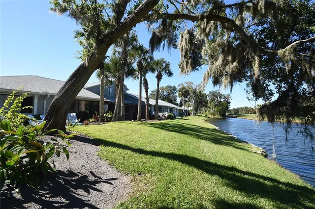 a view of a house with big yard