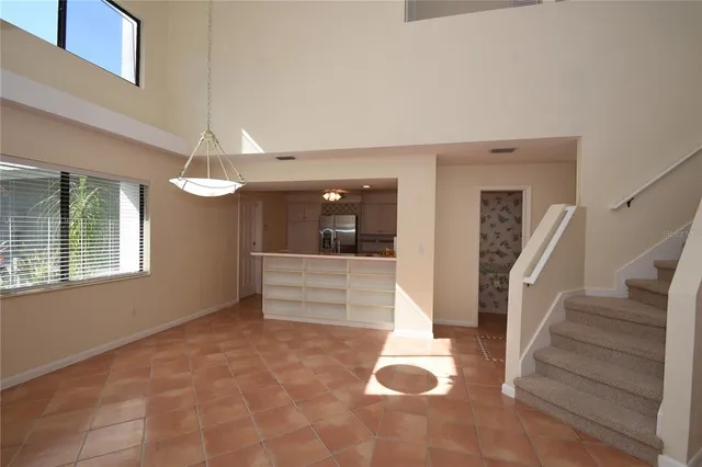 a view of entryway and hall with a window