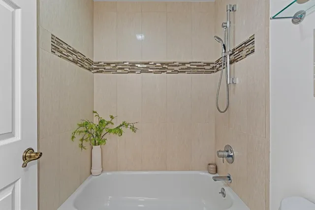 a bathroom with a shower curtain