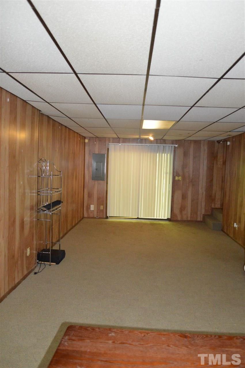 1945 Trexler Court Raleigh, NC 27606 - Photo 11 of 13 a view of an empty room with a window