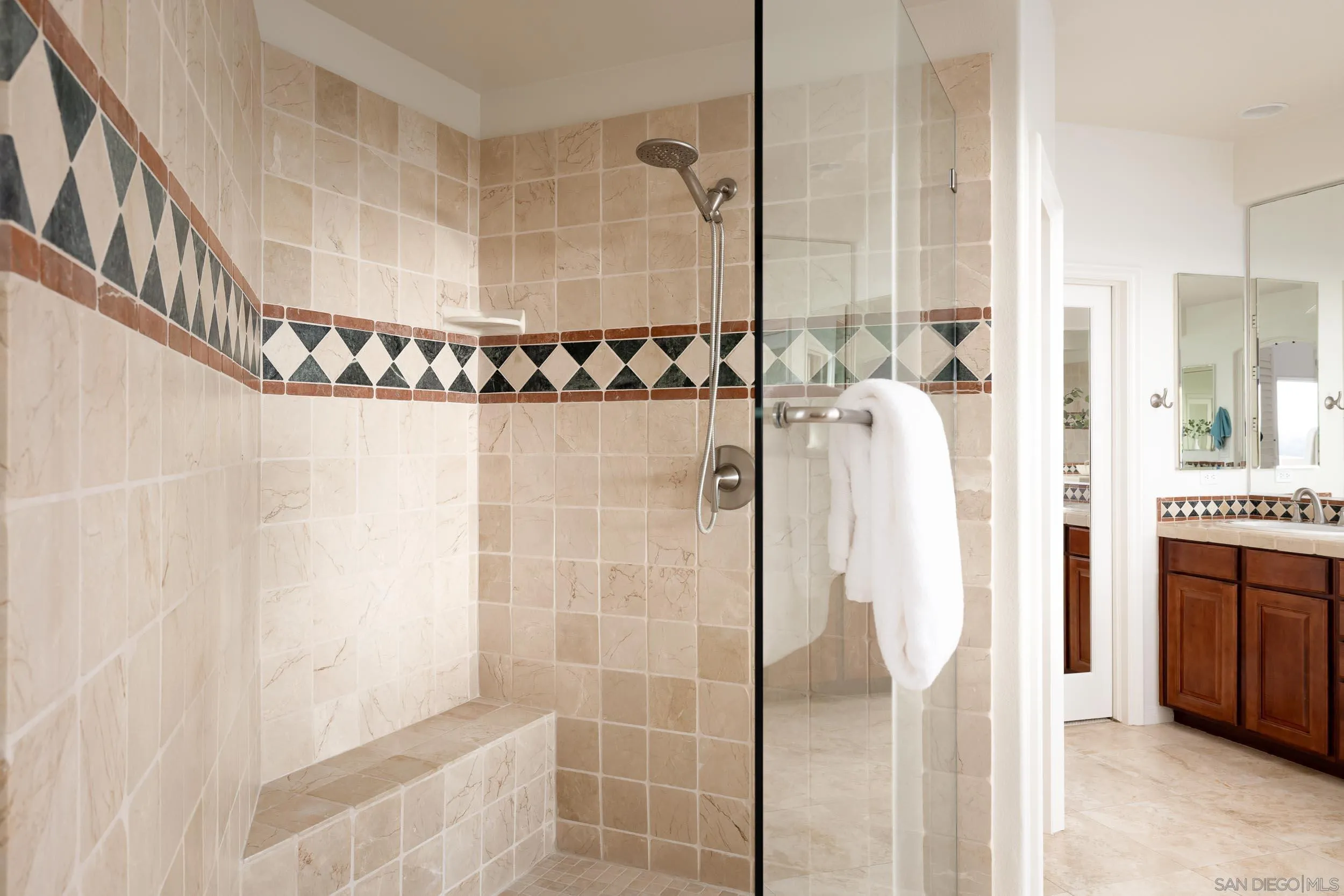 1786 Swallowtail Road Encinitas, CA 92024 - Photo 21 of 46 a bathroom with a shower