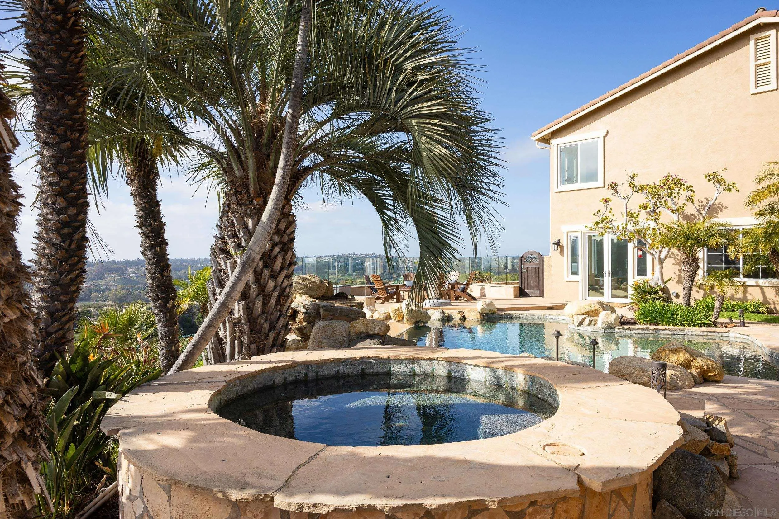 1786 Swallowtail Road Encinitas, CA 92024 - Photo 31 of 46 a view of kitchen with swimming pool and outdoor seating