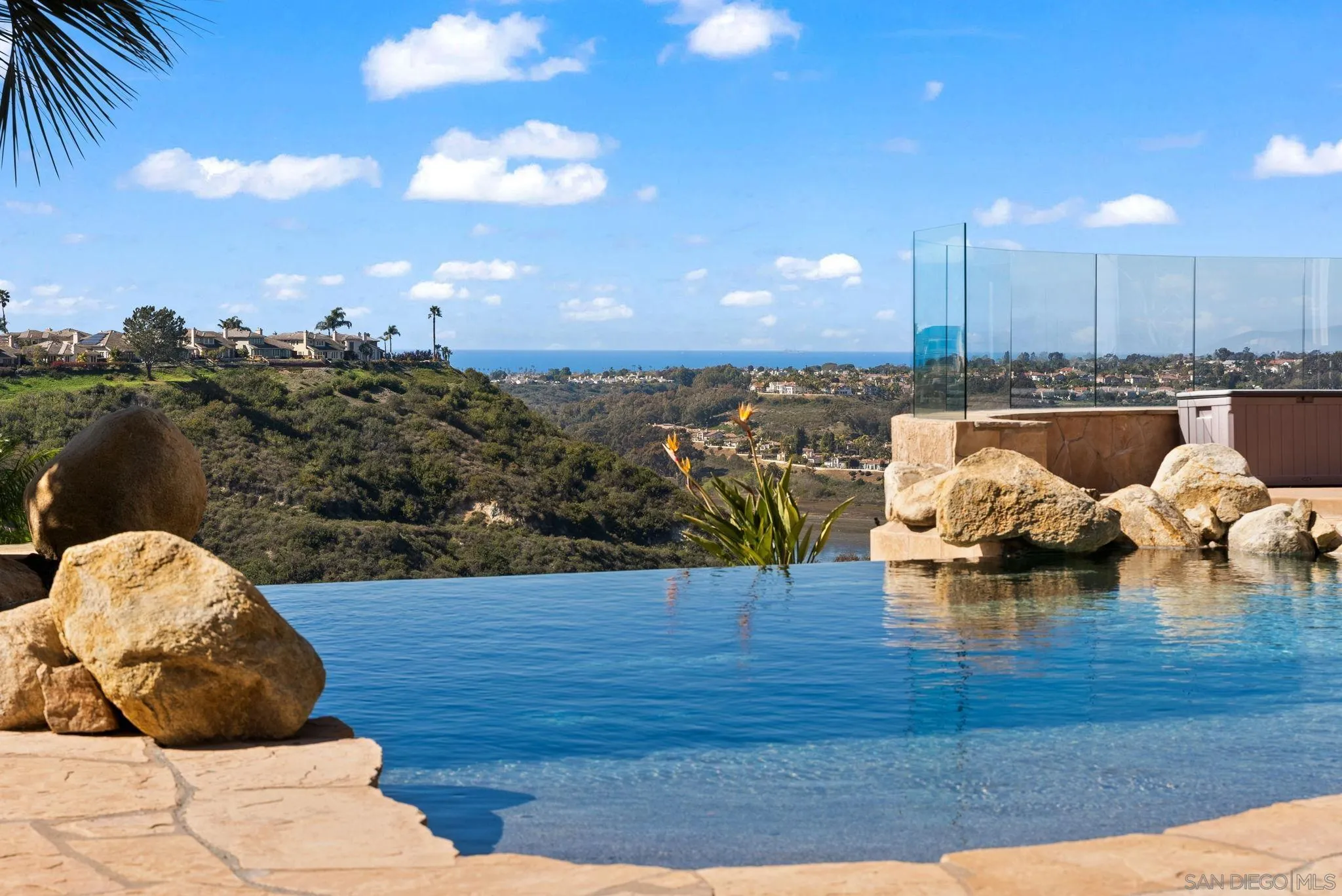 1786 Swallowtail Road Encinitas, CA 92024 - Photo 33 of 46 a view of a terrace with dining table and chairs