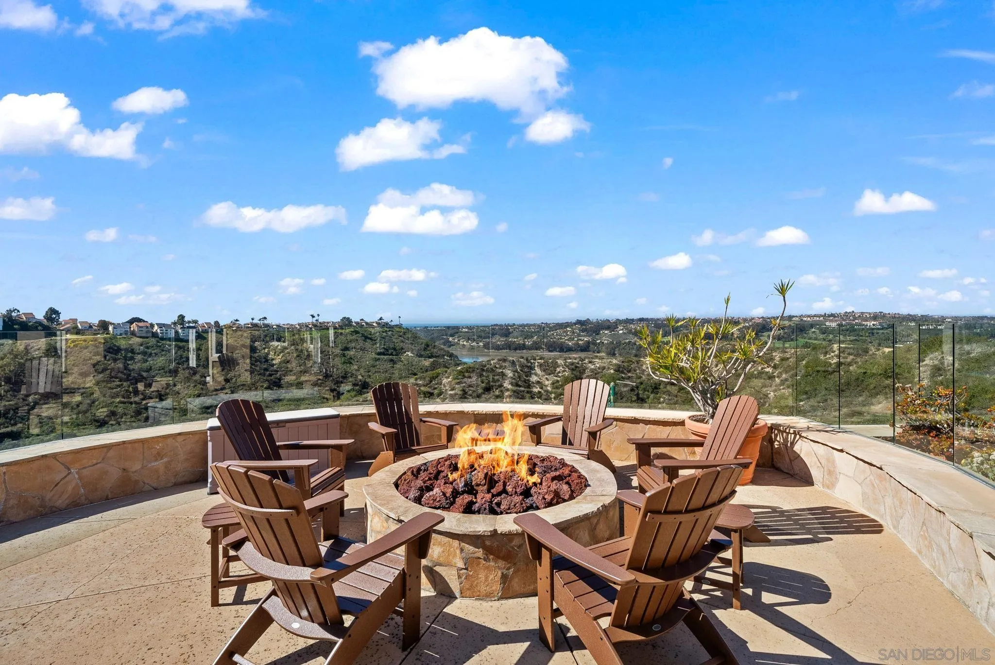 1786 Swallowtail Road Encinitas, CA 92024 - Photo 37 of 46 a view of a terrace with furniture and a potted plant