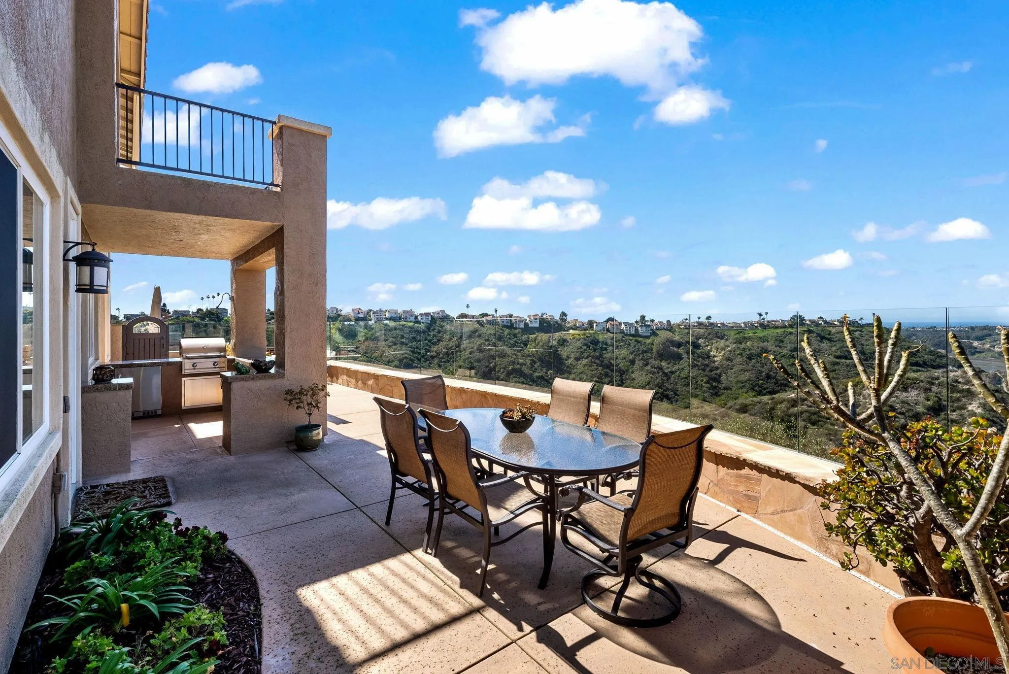 1786 Swallowtail Road Encinitas, CA 92024 - Photo 38 of 46 a view of a patio with a table and chairs