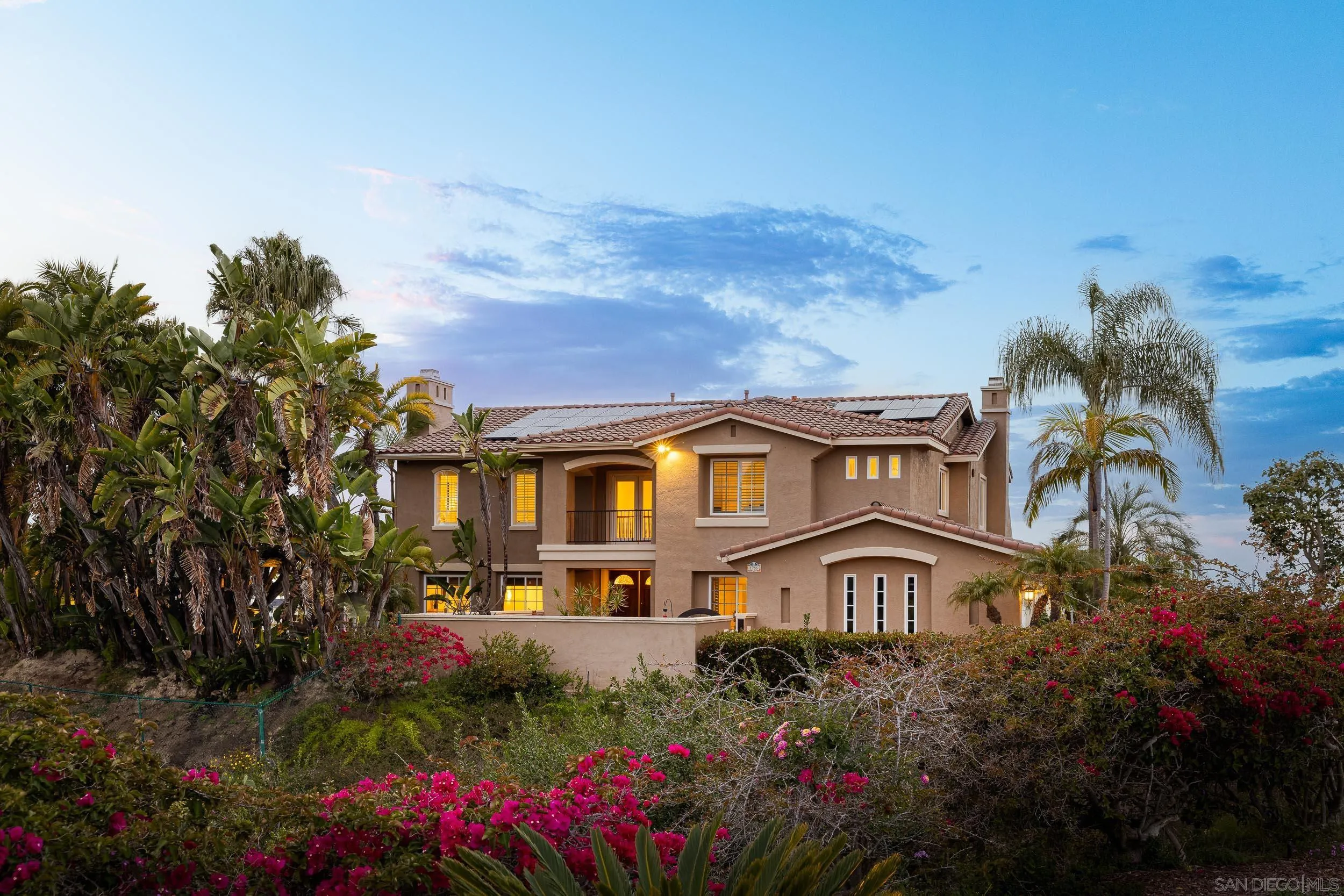 1786 Swallowtail Road Encinitas, CA 92024 - Photo 41 of 46 a front view of a house with a yard and fountain in middle