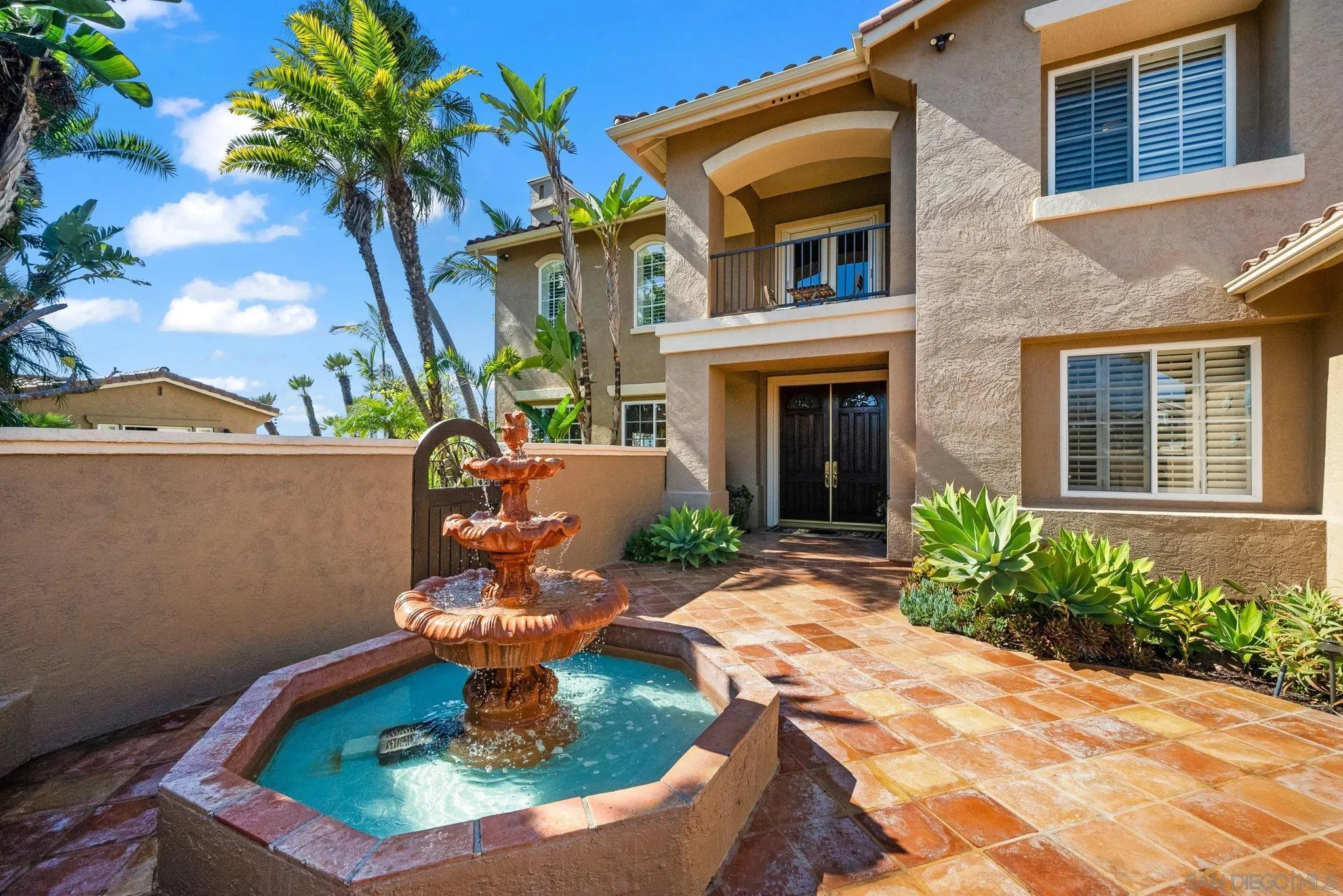 1786 Swallowtail Road Encinitas, CA 92024 - Photo 6 of 46 a front view of a house with a garden