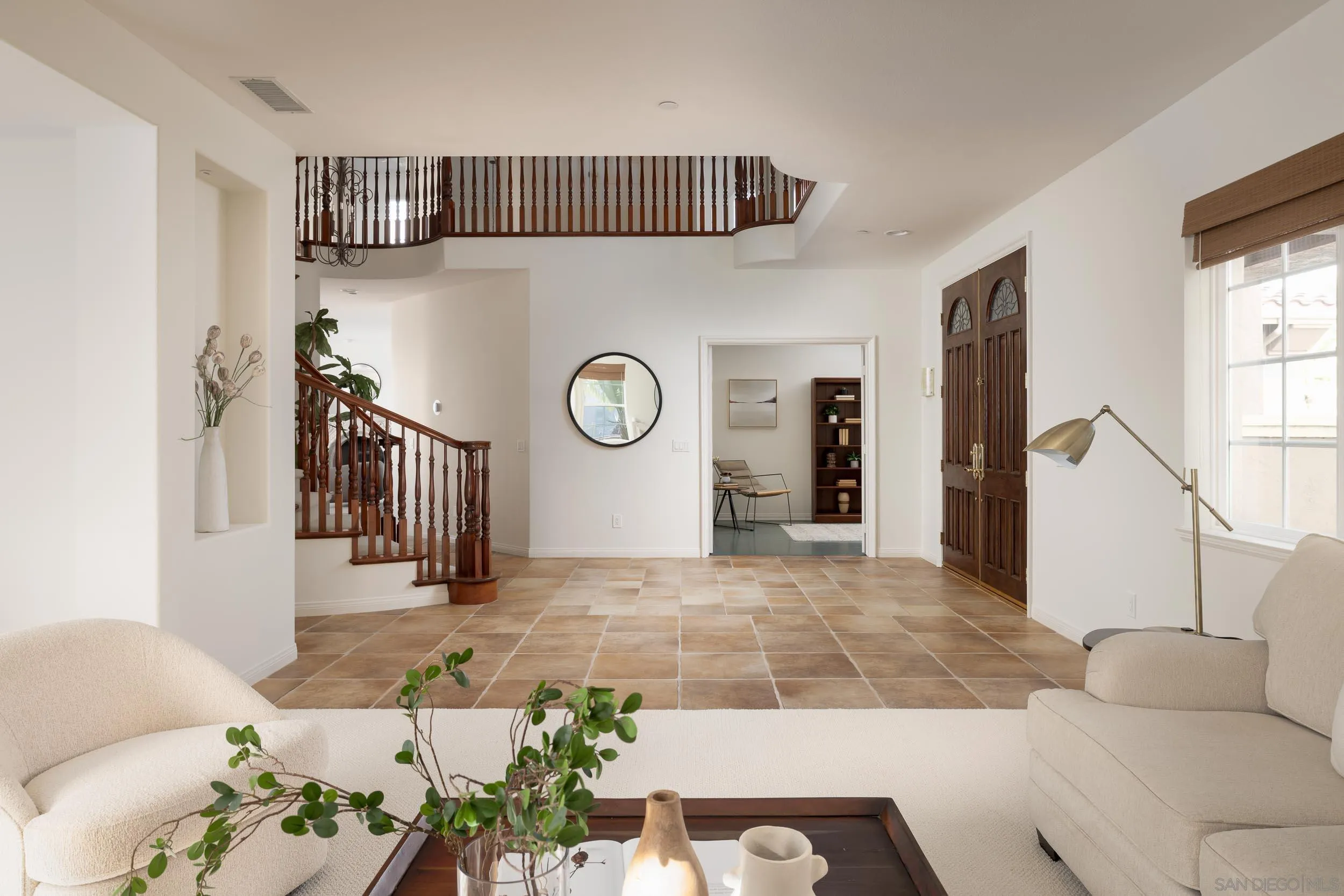 1786 Swallowtail Road Encinitas, CA 92024 - Photo 9 of 46 a view of a livingroom with furniture and windows