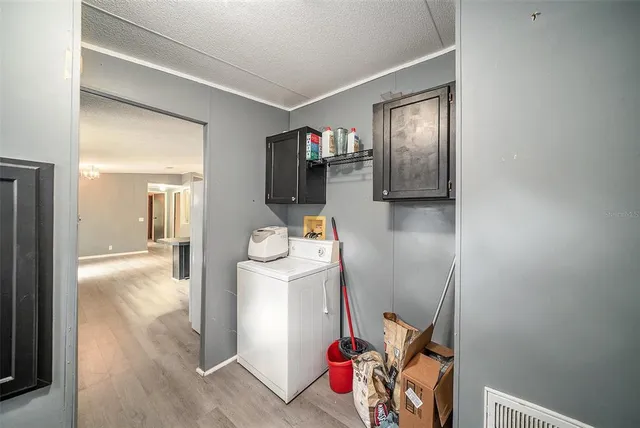 a bathroom with a sink mirror and toilet