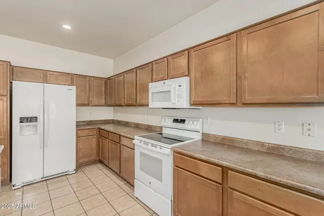 a bathroom with a sink a mirror and a shower