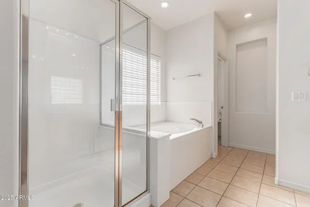a bathroom with a sink double vanity and a mirror