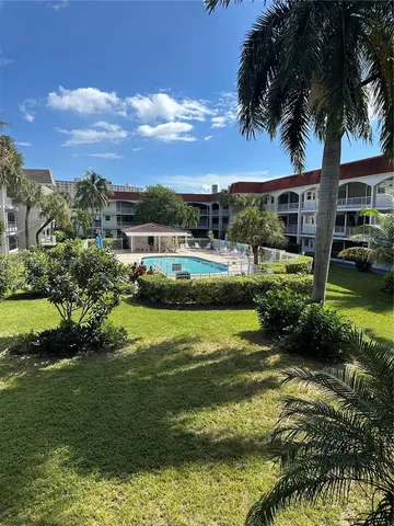 a view of a house with a big yard