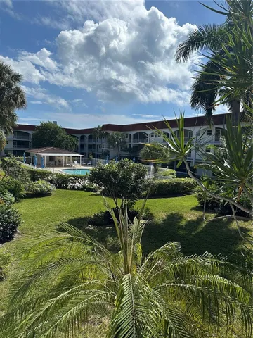 a view of swimming pool with a garden