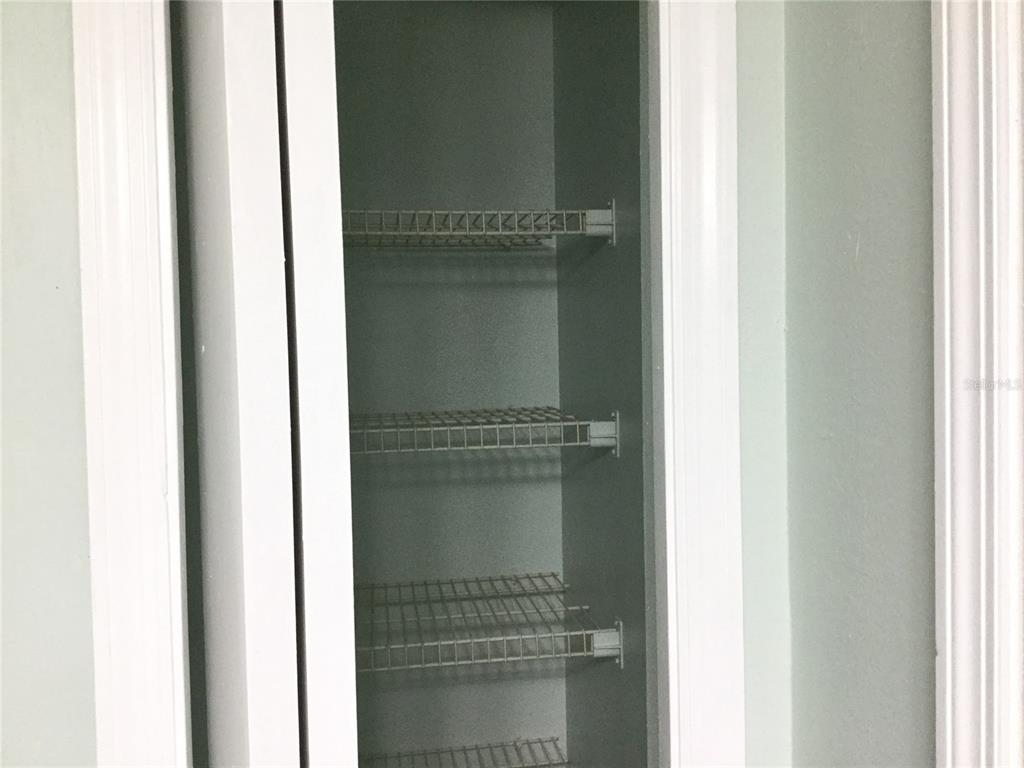 1744 Southwest 108th Lane, Unit B Ocala, FL 34476 - Photo 11 of 15 a close view of walk in closet with window