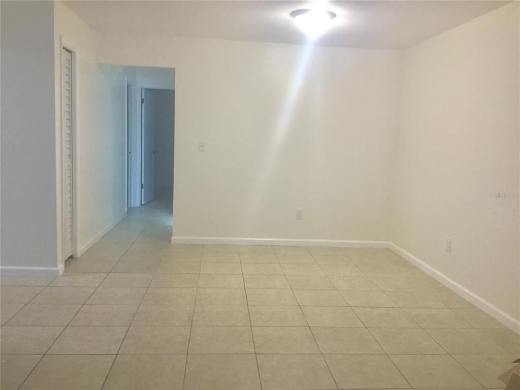 1744 Southwest 108th Lane, Unit B Ocala, FL 34476 - Photo 6 of 15 a view of an empty room