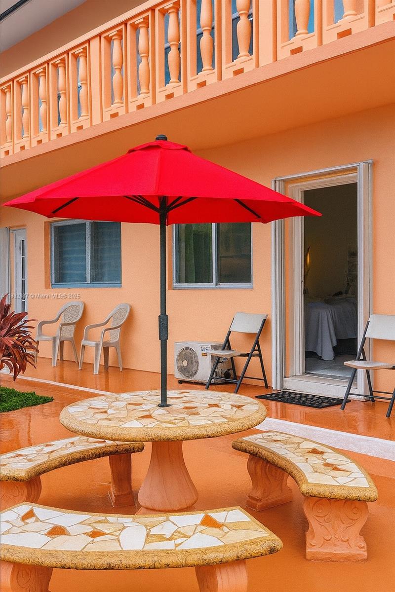 901 Southwest 11th Avenue, Unit 4H Hallandale Beach, FL 33009 - Photo 13 of 13 a view of a house with swimming pool