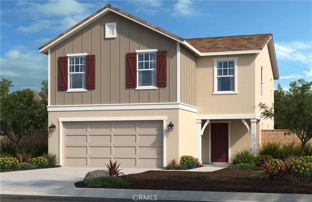 7685 Kuvera Bnd Street Riverside, CA 92507 - Photo 1 of 1 a front view of a house with a yard and garage