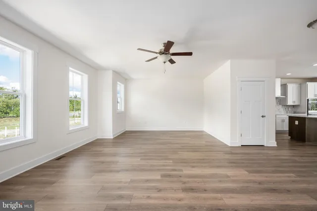 a view of entryway with wooden floor