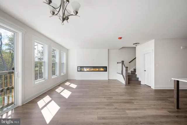 a kitchen with a sink stove and refrigerator