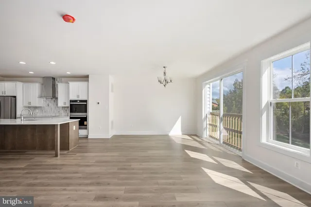 a bathroom with a double vanity sink mirror and a shower