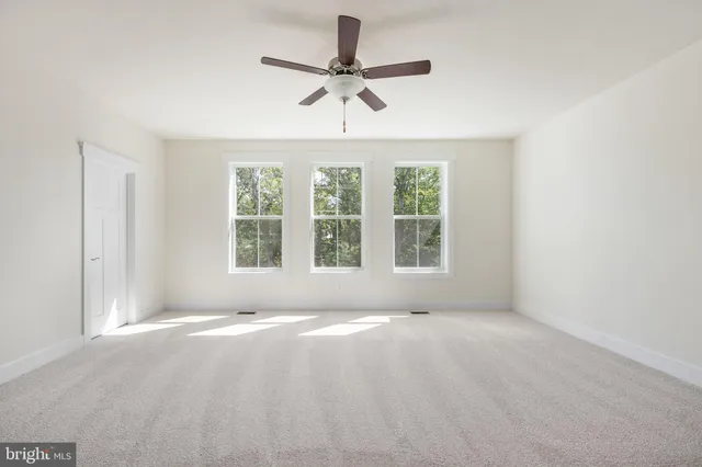 a view of building with a garden