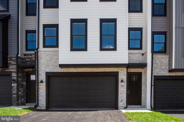a front view of a multi story residential apartment building