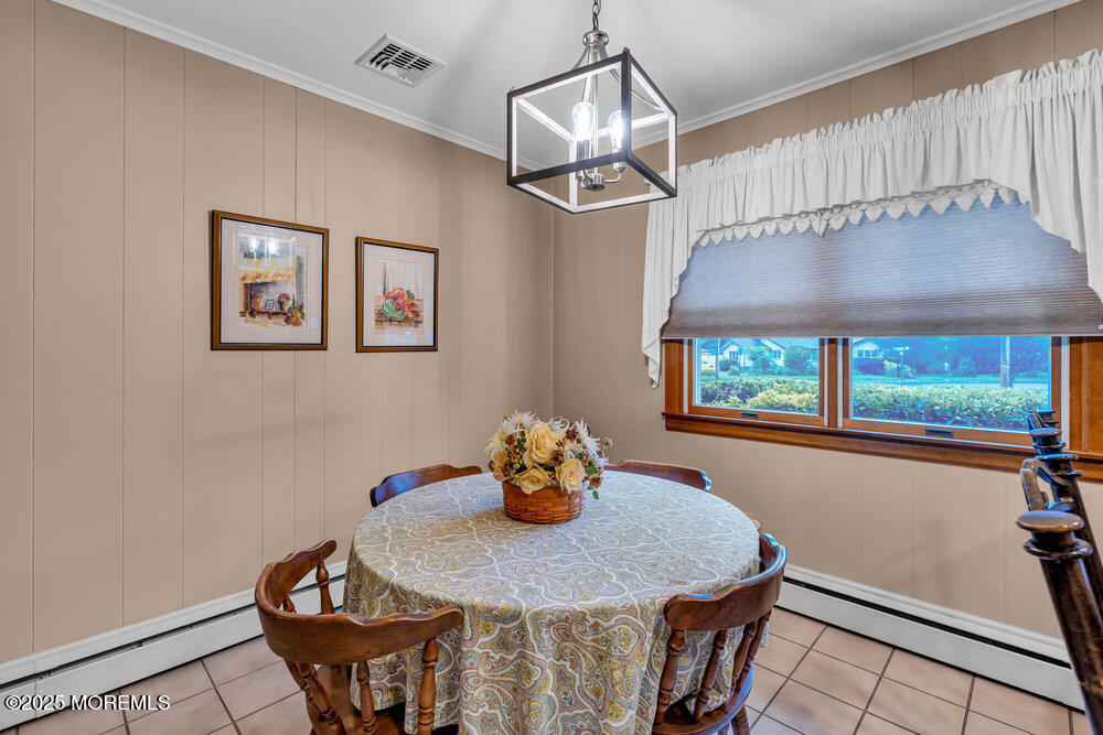 2308 Logan Road Asbury Park, NJ 07712 - Photo 17 of 37 a dining room with furniture and window