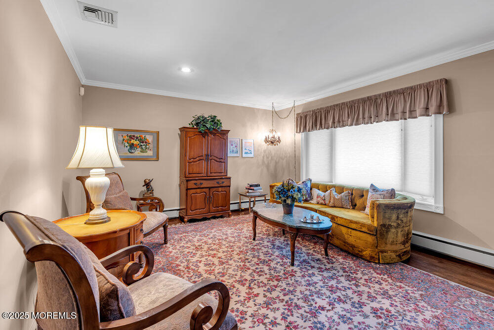 2308 Logan Road Asbury Park, NJ 07712 - Photo 20 of 37 a living room with furniture and a window