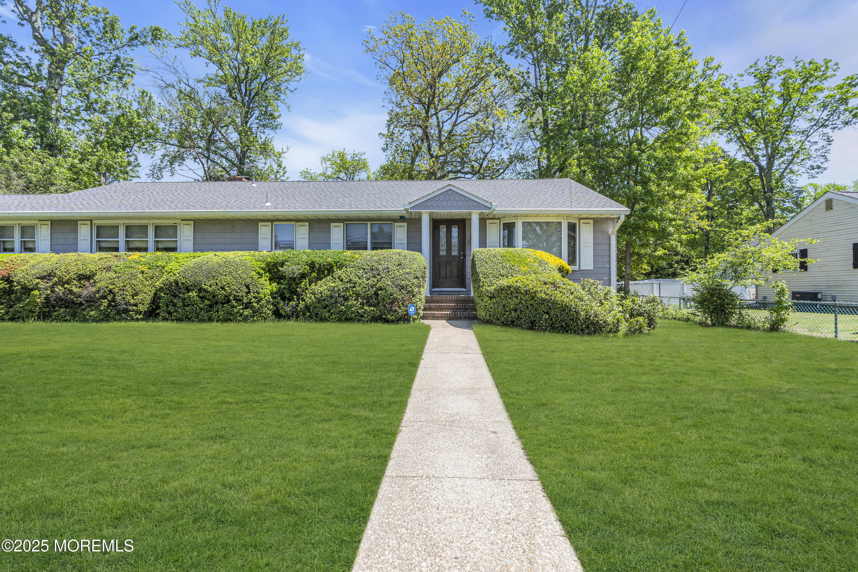 2308 Logan Road Asbury Park, NJ 07712 - Photo 2 of 37 a front view of a house with a yard