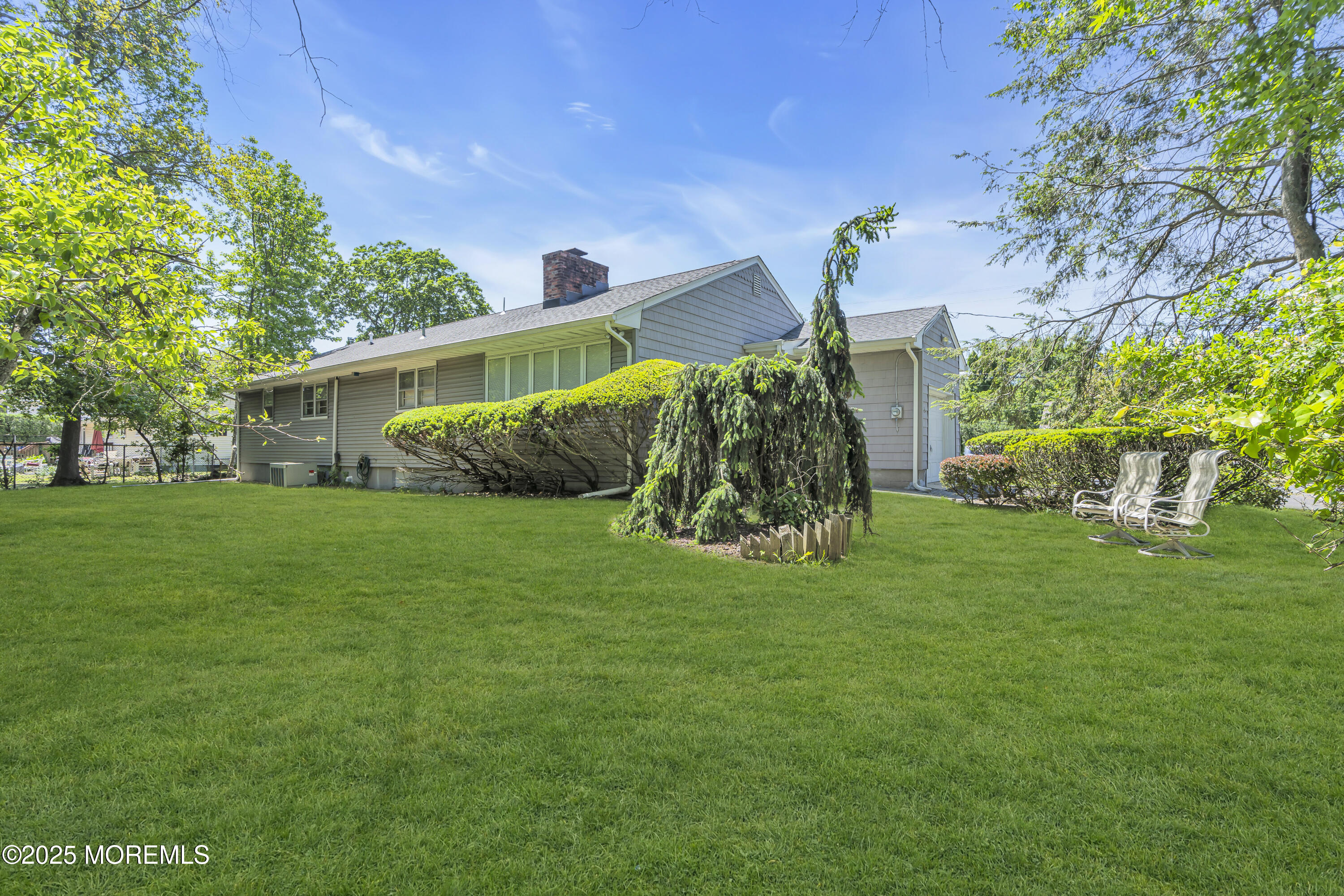 2308 Logan Road Asbury Park, NJ 07712 - Photo 31 of 37 a front view of a house with garden