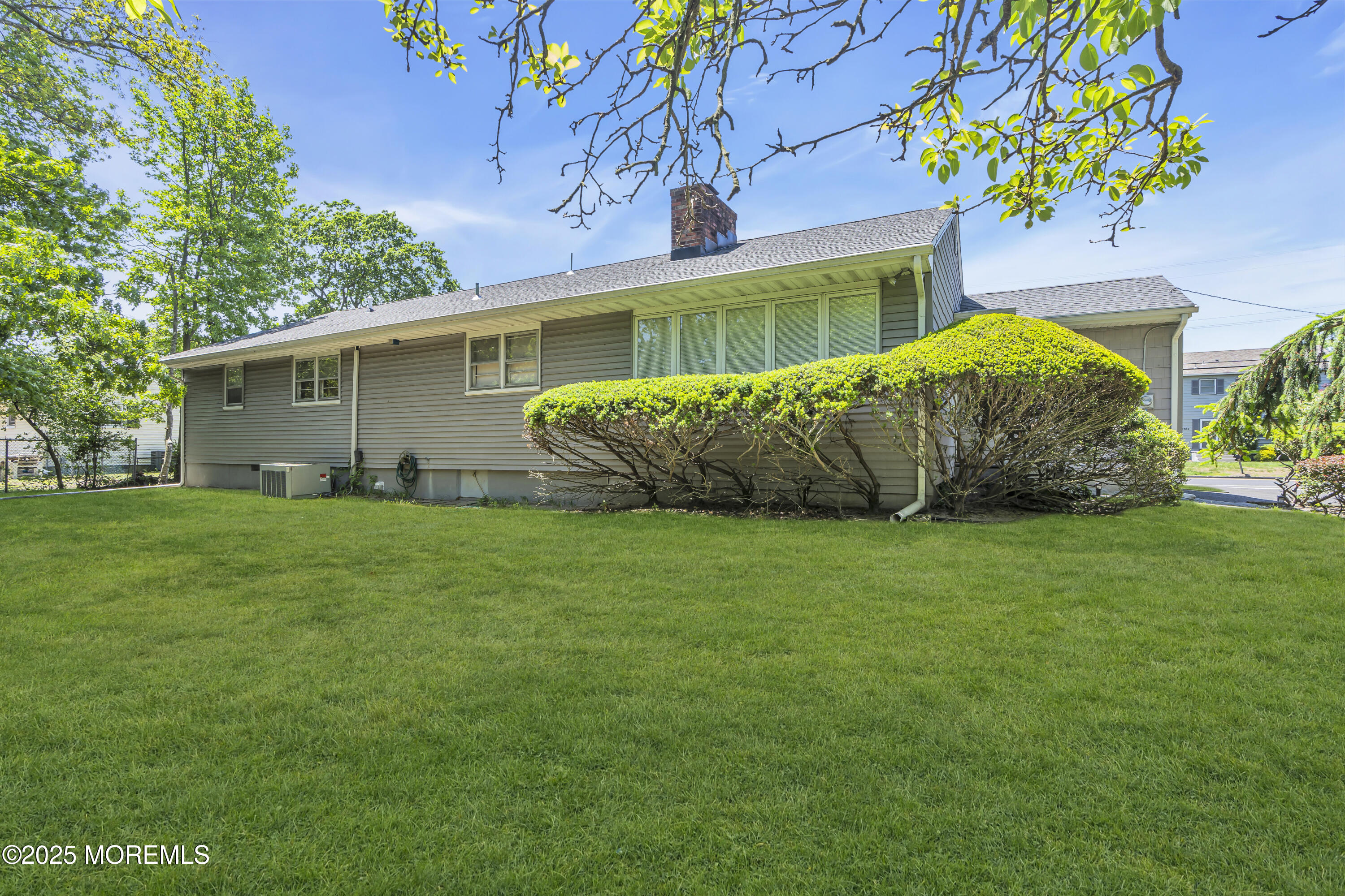 2308 Logan Road Asbury Park, NJ 07712 - Photo 33 of 37 a front view of a house with a garden