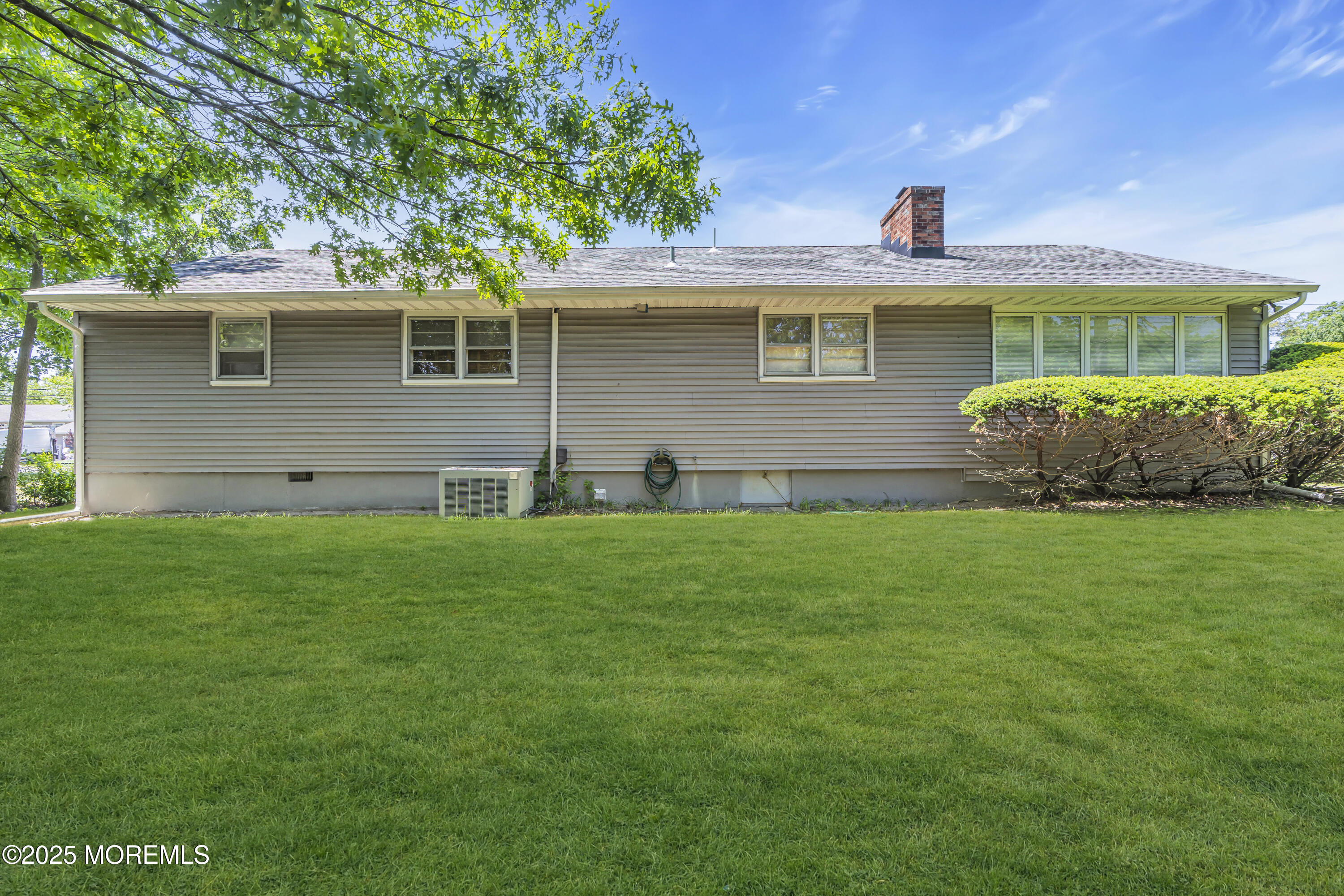 2308 Logan Road Asbury Park, NJ 07712 - Photo 34 of 37 a front view of a house with a garden