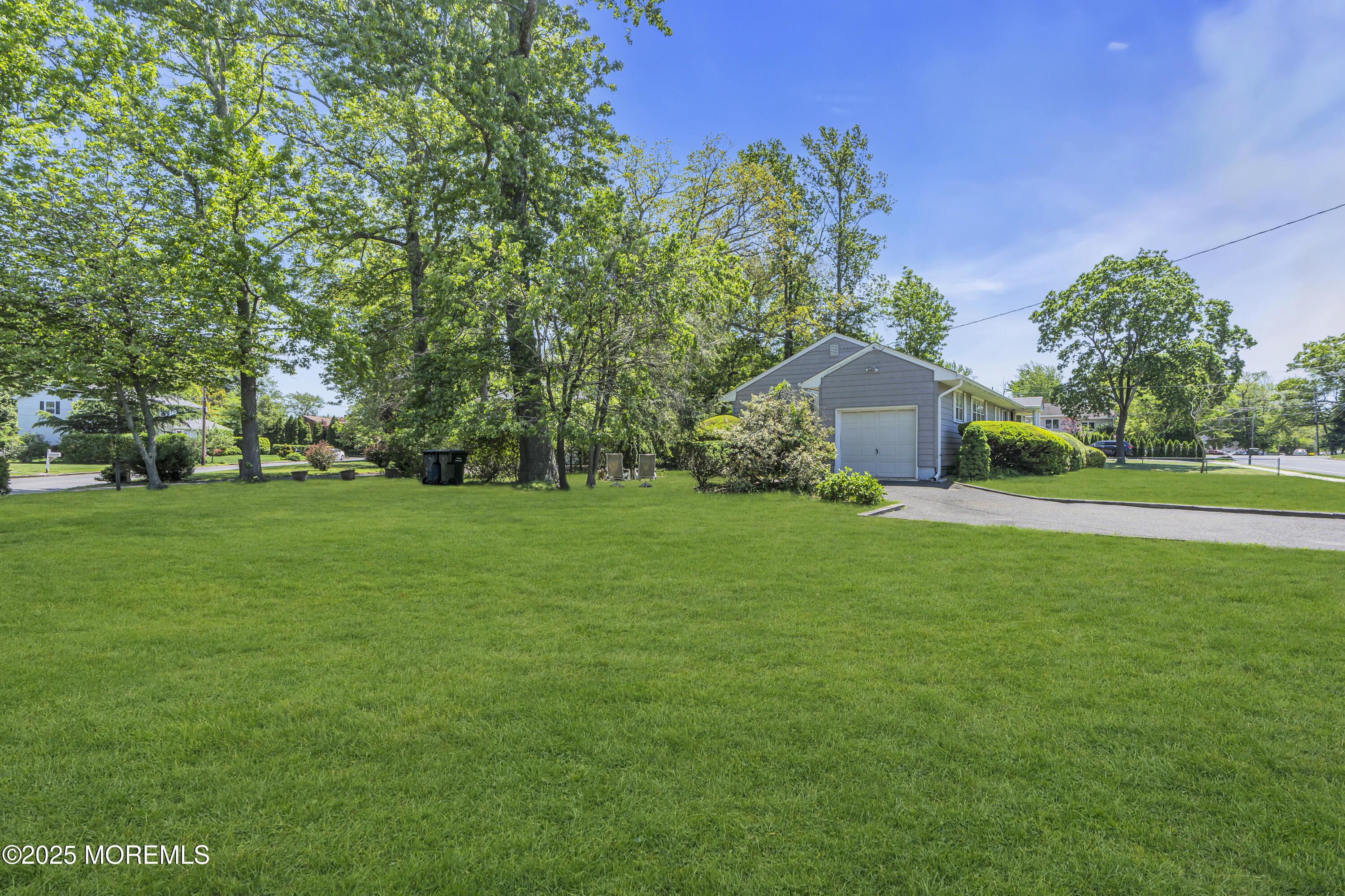 2308 Logan Road Asbury Park, NJ 07712 - Photo 36 of 37 a front view of a house with garden