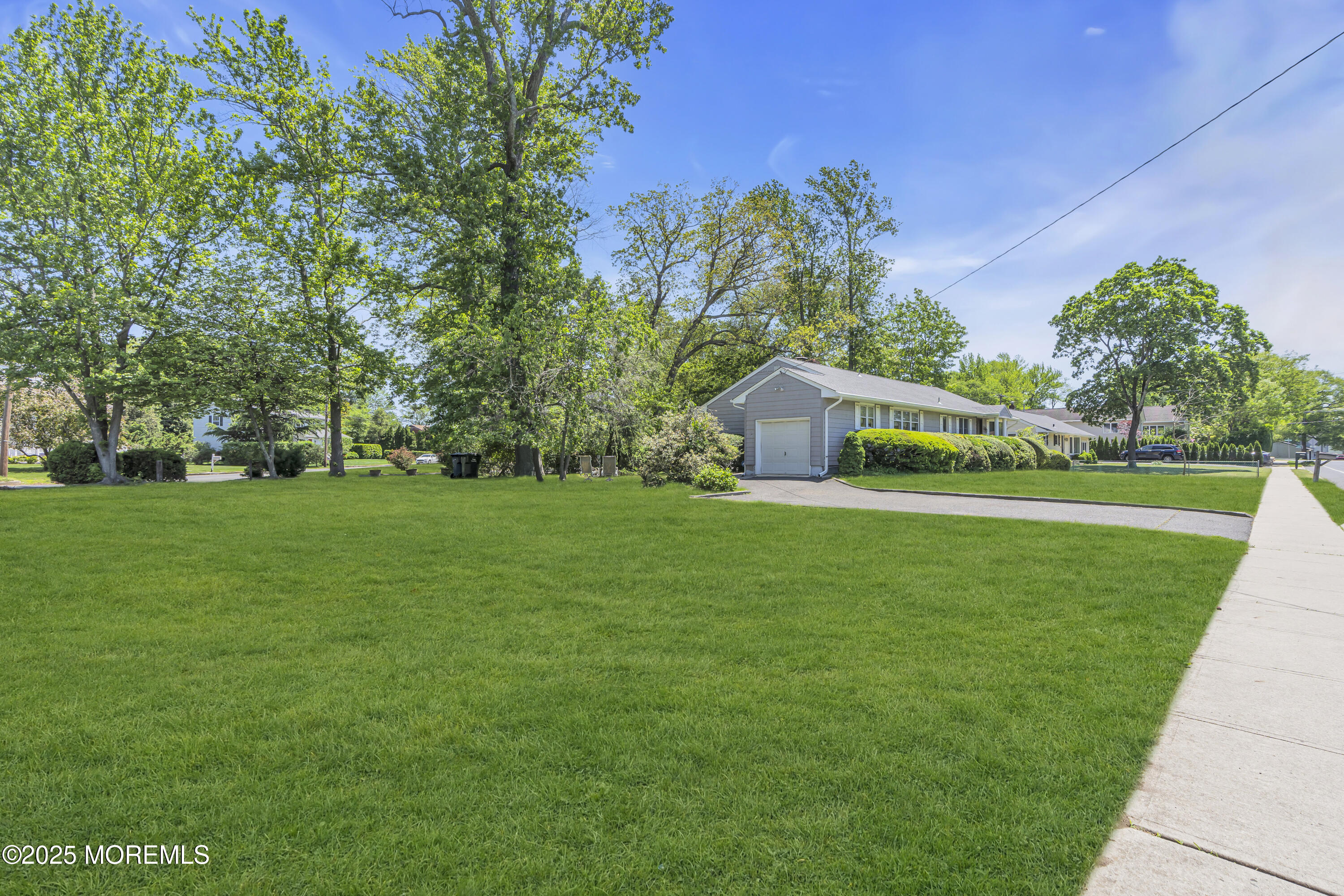 2308 Logan Road Asbury Park, NJ 07712 - Photo 4 of 37 a front view of a house with garden