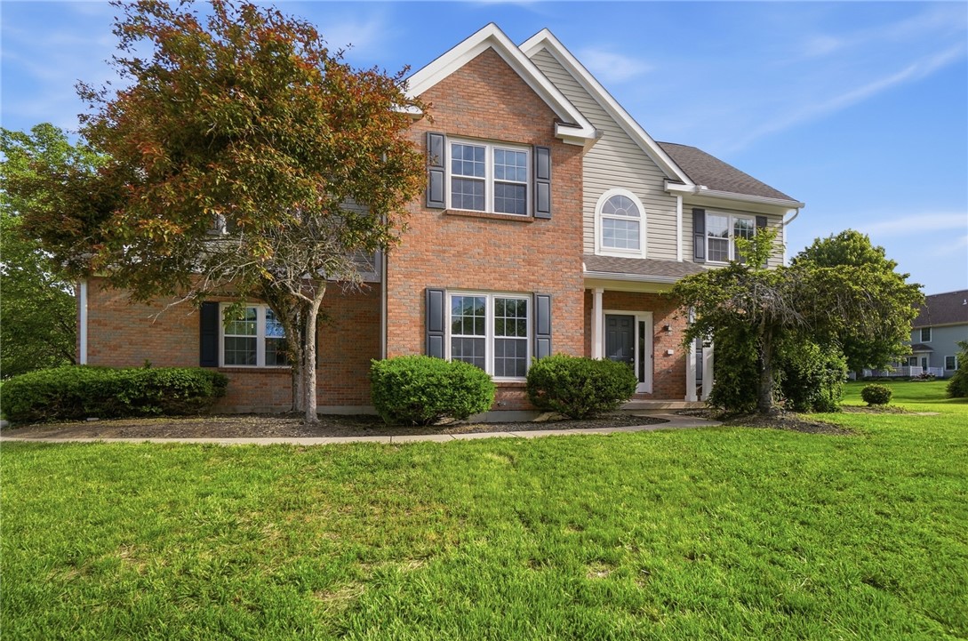 10 Chase Court Springboro, OH 45066 - Photo 1 of 75 This classic two-story residence features a brick facade and inviting entryway, perfect for modern living.