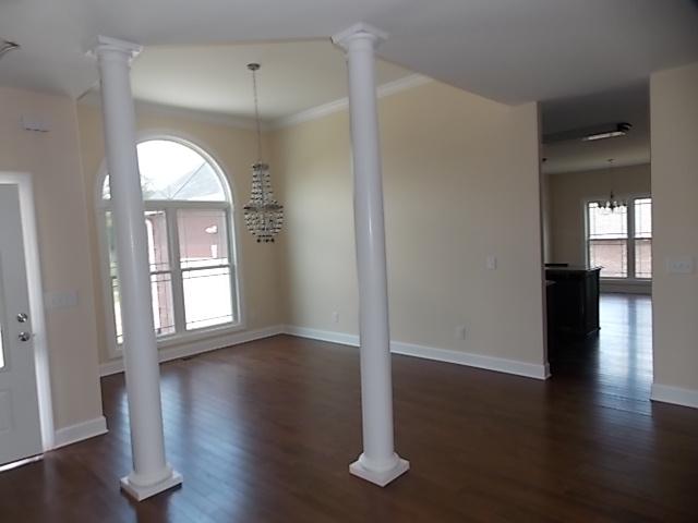 663 Sugar Flat Road Lebanon, TN 37087 - Photo 4 of 16 wooden floor in an empty room with a window