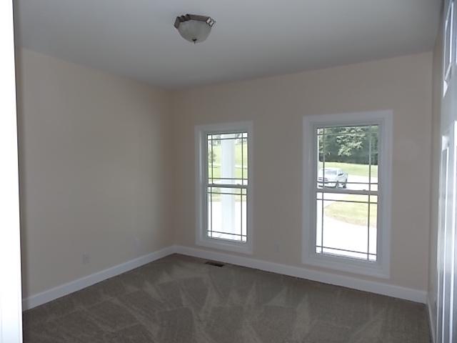 663 Sugar Flat Road Lebanon, TN 37087 - Photo 5 of 16 an empty room with window