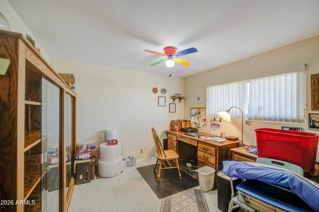 a view of a workspace with furniture and a livingroom